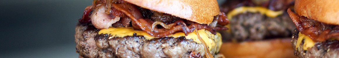 Eating American (Traditional) Burger at Graffiti Junktion - Lake Mary restaurant in Lake Mary, FL.